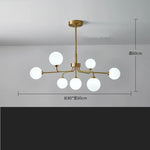 suspension lumineuse moderne or blanc sphères translucides structure métallique interrupteur tactile led