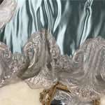 Détail du tissage jacquard de la parure de lit