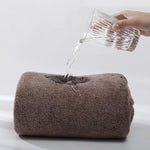 serviette bain marron clair texture épaisse douce séchage rapide lavable machine moderne confortable bordure