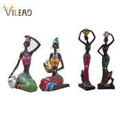 figurine africaine résine femme détails texturés noir rouge bleu argent vintage