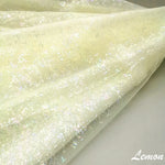 tissu polyester brillant effet paillettes moderne vert pastel rose violet bleu clair opaque décoration