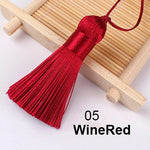 pompons soie polyester 5cm longueur 18cm corde noir rose rouge vert jaune bleu modernes