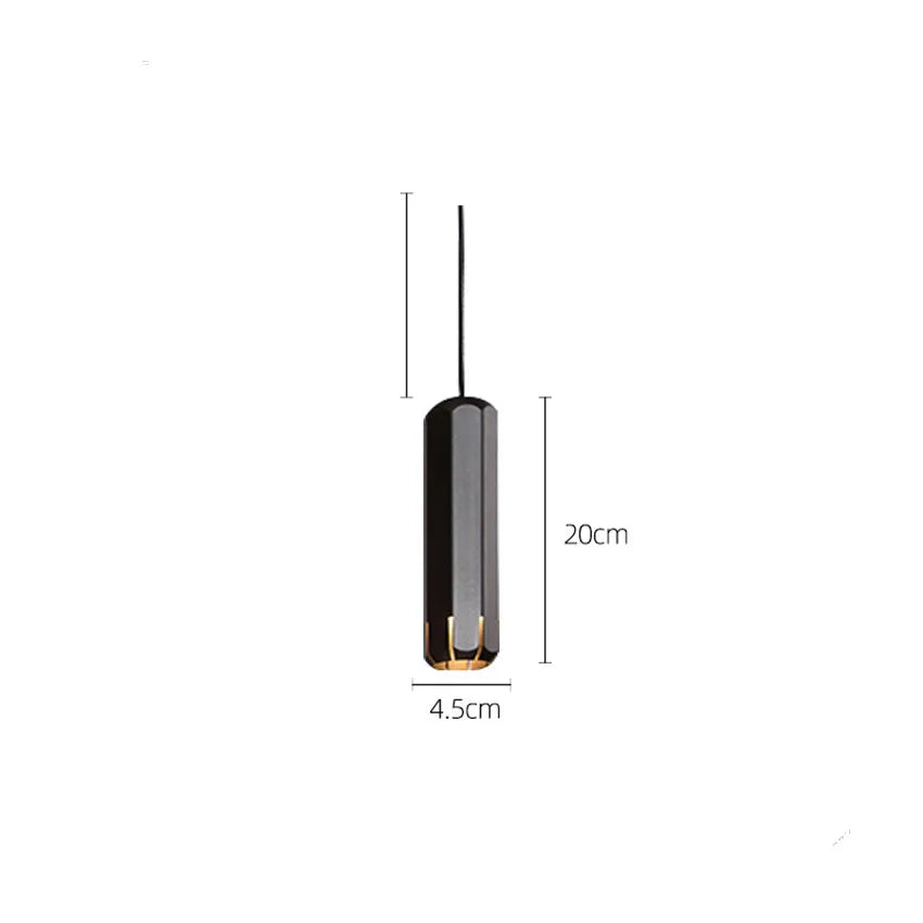 lampe suspendue or rose moderne facettes géométriques câble noir chambre salon