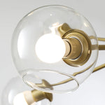 suspension lumineuse moderne or noir sphères transparentes scandinave