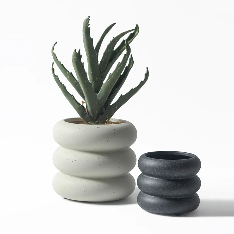 cache pot céramique moderne gris orange texture granuleuse fleur plante intérieure contemporain minimaliste