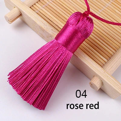 pompons soie polyester 5cm longueur 18cm corde noir rose rouge vert jaune bleu modernes