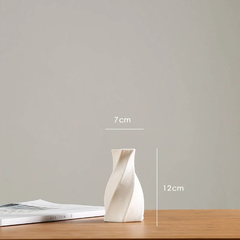 vases blancs modernes minimalistes céramique opaques fleurs artificielles table simple