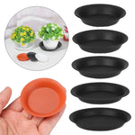 assiettes rondes modernes différentes tailles noir blanc orange solides intérieur extérieur