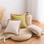 coussins decoratifs bohemes couleurs multicolores tissu texturé franges rustique