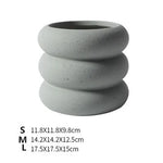 cache pot céramique moderne gris orange texture granuleuse fleur plante intérieure contemporain minimaliste