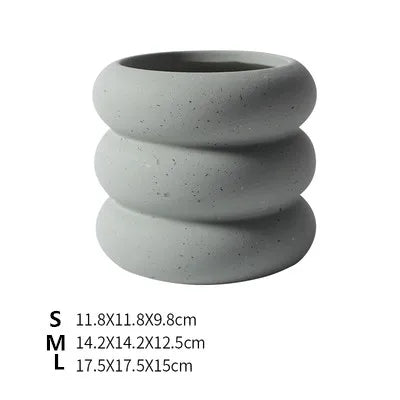 cache pot céramique moderne gris orange texture granuleuse fleur plante intérieure contemporain minimaliste