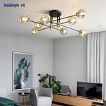 lampe suspension moderne noir doré sphères translucides led restaurant chambre salon