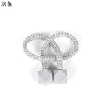 attaches rideaux décoratives modernes couleurs vives tressure cordée forme cube prismatique fixations nodales