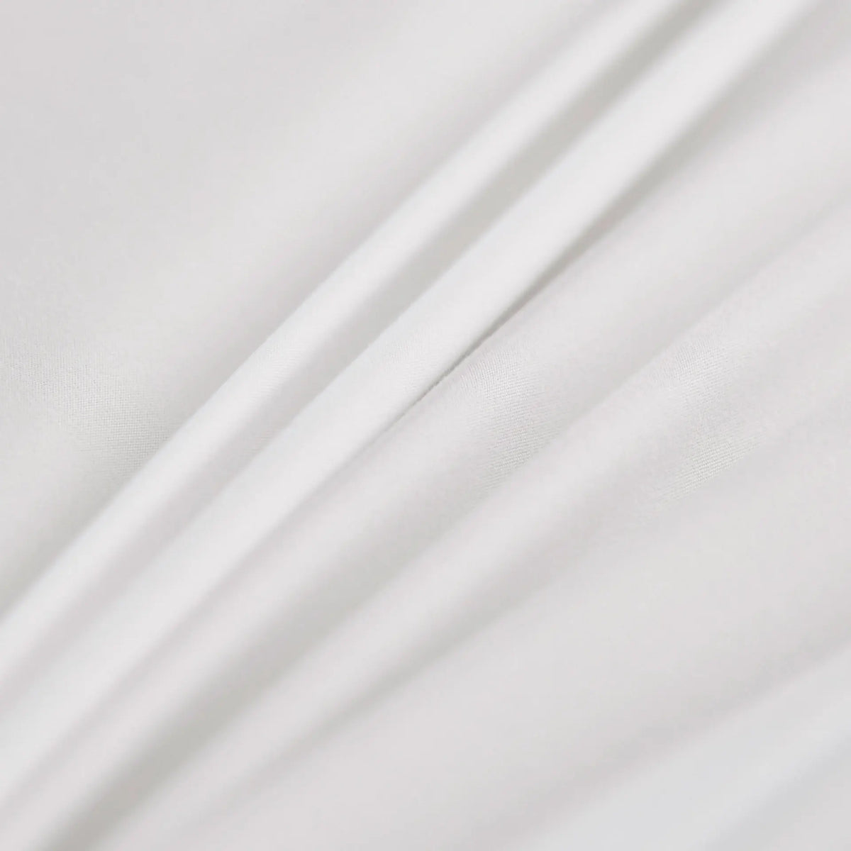 Détail du tissu lisse du couvre-lit