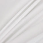 Détail du tissu lisse du couvre-lit