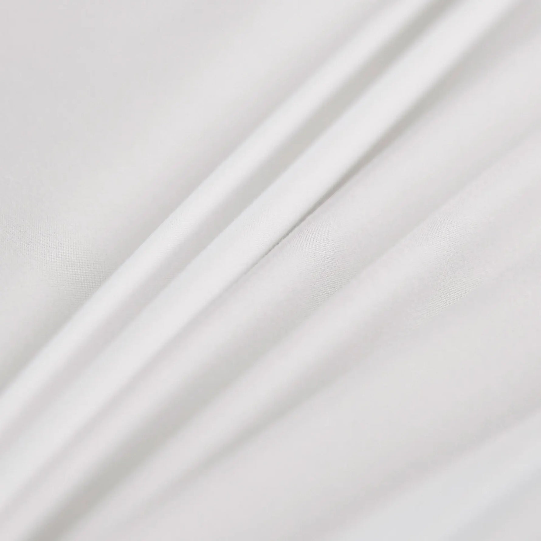 Détail du tissu lisse du couvre-lit
