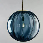 lumière suspendue verre texturé bleu rouge moderne minimaliste semi transparent filaire