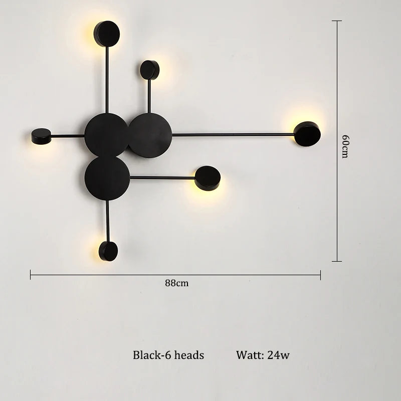 lampes murales modernes abstrait cercles tiges métalliques noir doré minimaliste têtes