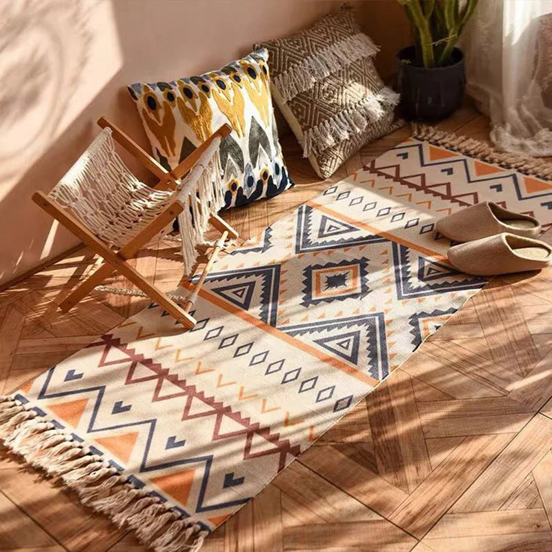 tapis boho chic motifs géométriques beige bleu orange franges extérieur plage