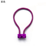attaches rideaux décoratives modernes couleurs vives tressure cordée forme cube prismatique fixations nodales