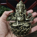 statue ganesha bronze détaillée motifs traditionnels bouddhiste artisanat décoration intérieure figure éléphant