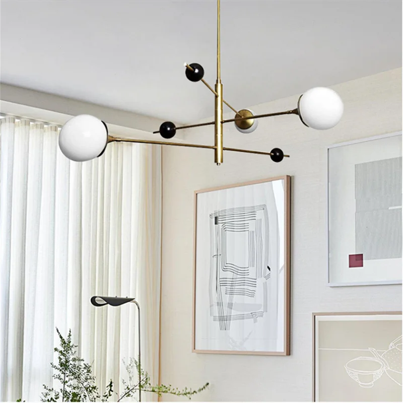suspension lumineuse moderne or noir sphères blanches led minimaliste structure métallique chromé six globes