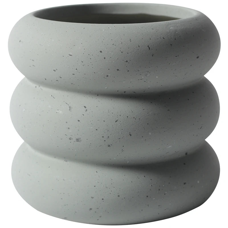 cache pot céramique moderne gris orange texture granuleuse fleur plante intérieure contemporain minimaliste