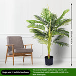 décoration extérieure plante artificielle verte moderne grande feuilles pot noir exposition sol festive
