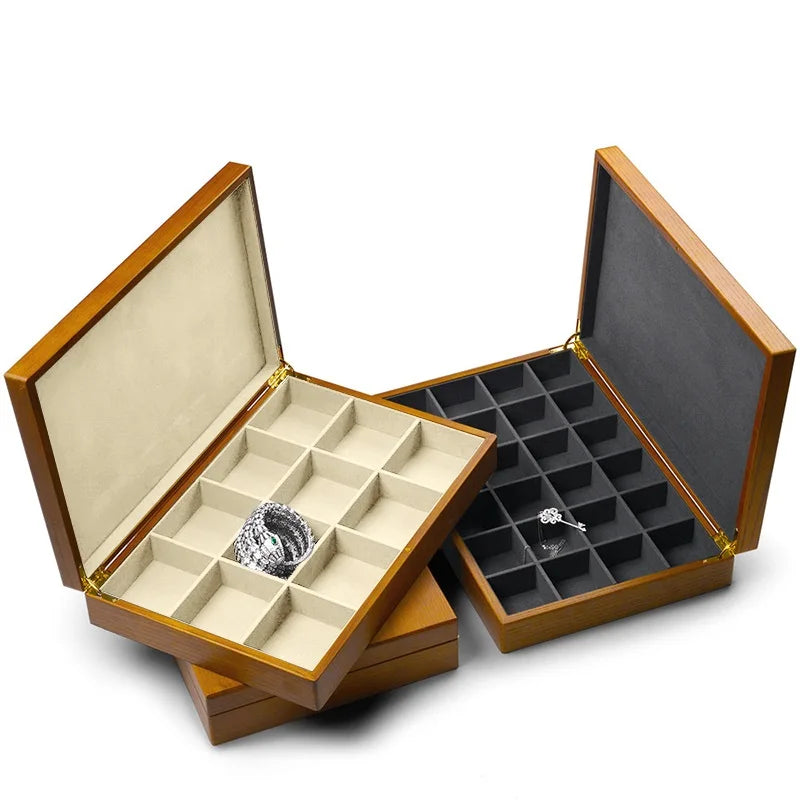 boîtes bijoux bois marron clair intérieur velours noir classique poignées dorées rangement colliers pendentifs