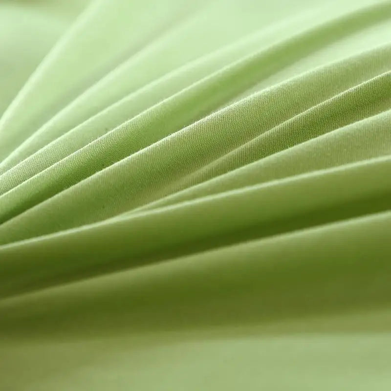 Vue rapprochée de la housse de couette matelassée pour un confort optimal