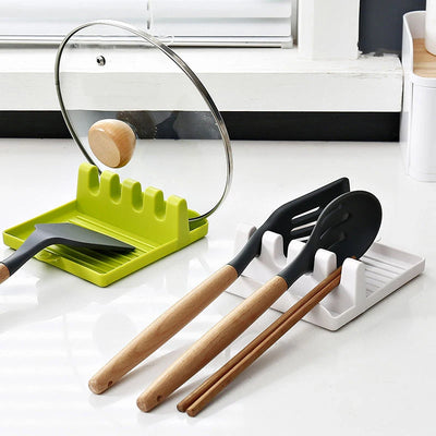 Porte-cuillères organisateur de cuisine en plastique vert sur plan de travail