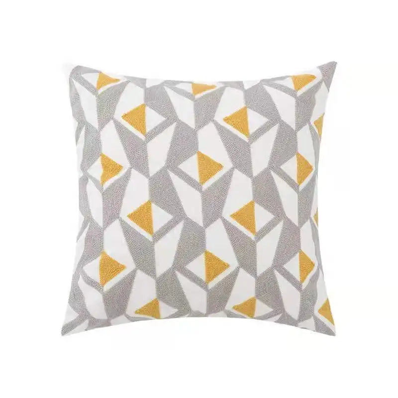 housse coussin brodée géométrique moderne fleur abstraite couleur beige blanc vert jaune décoration intérieure