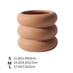 cache pot céramique moderne gris orange texture granuleuse fleur plante intérieure contemporain minimaliste