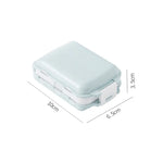 organisateur médicaments boîte pilules compartiments clips couleurs vert rose pratique compact