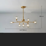 suspension lumineuse moderne or blanc sphères translucides structure métallique interrupteur tactile led