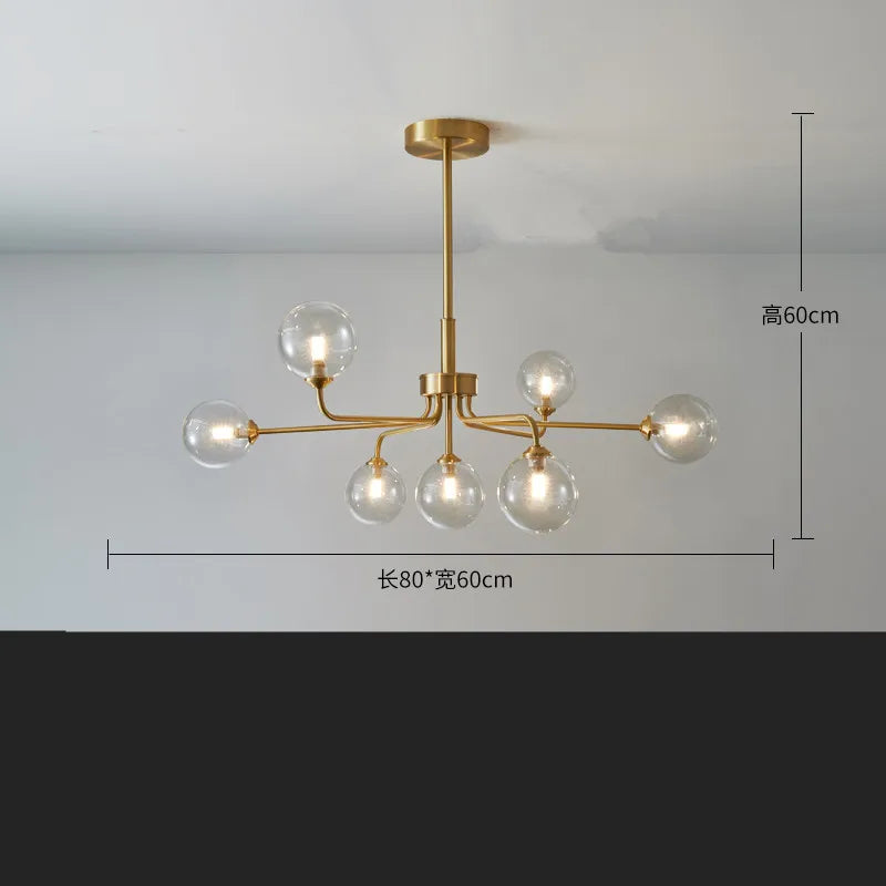 suspension lumineuse moderne or blanc sphères translucides structure métallique interrupteur tactile led