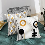 housse coussin brodée géométrique moderne fleur abstraite couleur beige blanc vert jaune décoration intérieure