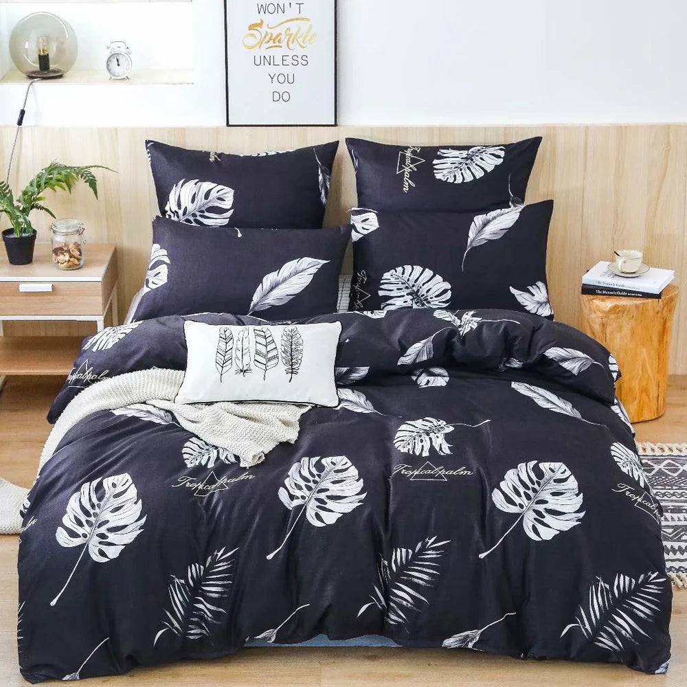Parure de lit 140x200 en polyester sergé noir sur un lit moderne