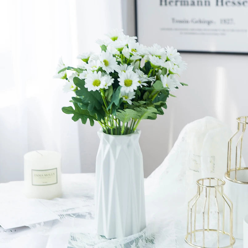 bouquet marguerites soie orange jaune rose blanc vase blanc moderne décoration intérieur mariage