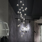 suspension lumineuse moderne verre transparent sphères simples éclairage led contemporain fixations invisibles