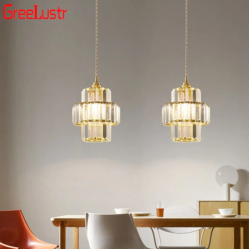 Suspension lumineuse transparente moderne rangs verre dorés élégante chambre salon
