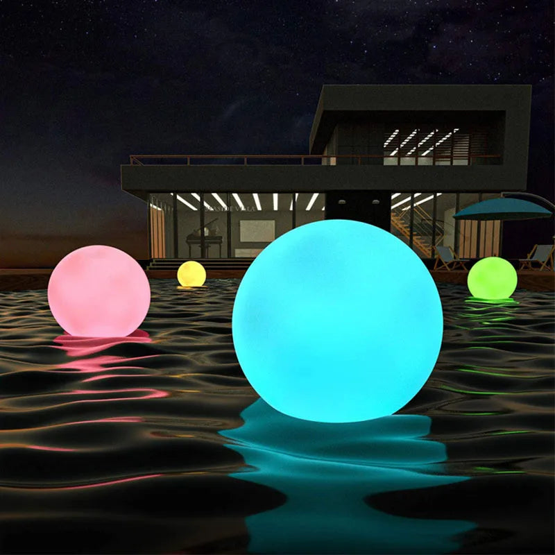 Boule lumineuse LED bourgogne avec télécommande RGB sur table