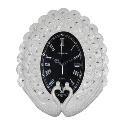 horloge murale art déco plumes paon strass solaire résine noir argenté unique
