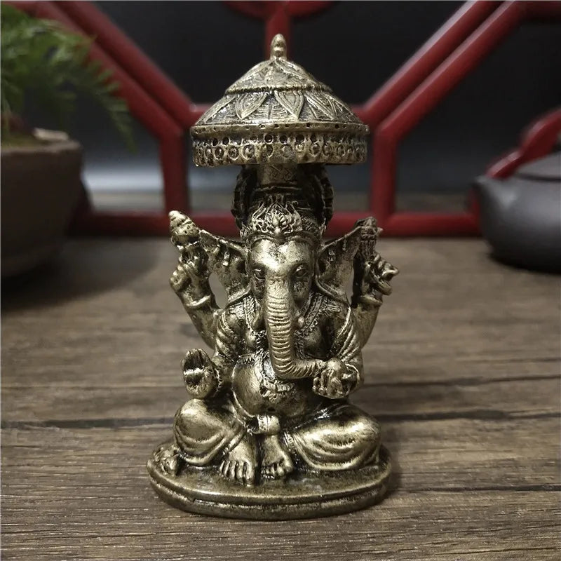 statue ganesha dorée résine ornements complexes décoration intérieure artisanale traditionnelle bouddhiste éléphant multiple bras