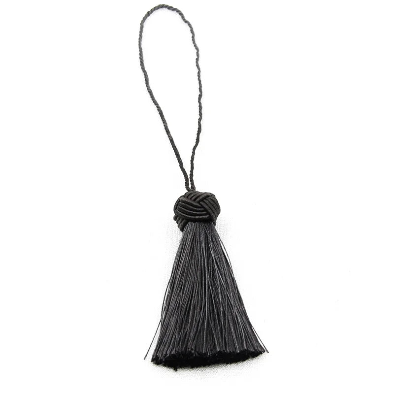 pompons franges decoration maison beige gris blanc bleu marine noir tissu élégant