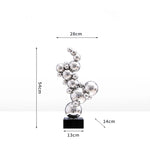 sculpture abstraite moderne sphères métal or rose arc ciel gris argenté contemporaine