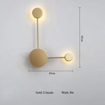 lampes murales modernes abstrait cercles tiges métalliques noir doré minimaliste têtes
