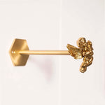 pince rideau dorée insectes anges détails sculptés quincaillerie fenêtre vintage opaques