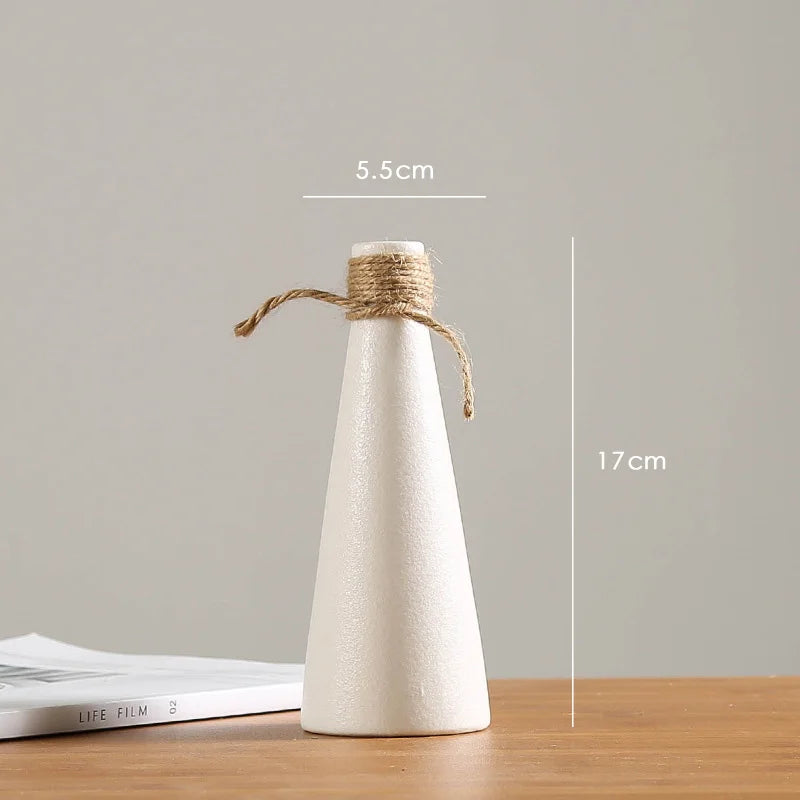 vases blancs modernes minimalistes céramique opaques fleurs artificielles table simple