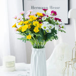 bouquet marguerites soie orange jaune rose blanc vase blanc moderne décoration intérieur mariage